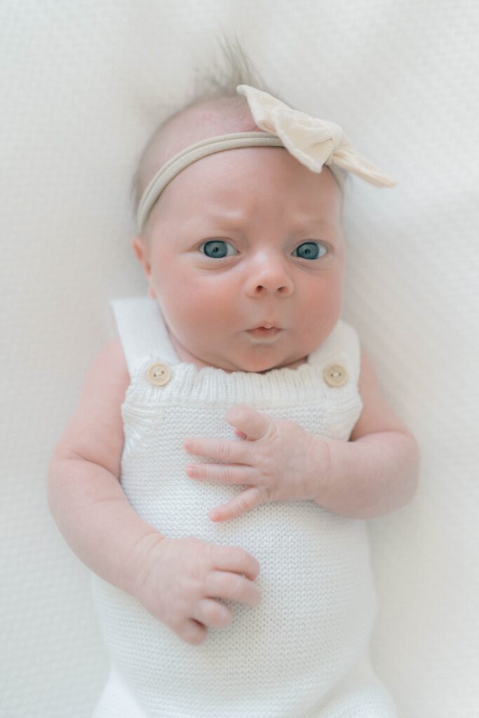 newborn photos at home in the nursery. Captured by Utah newborn photographer