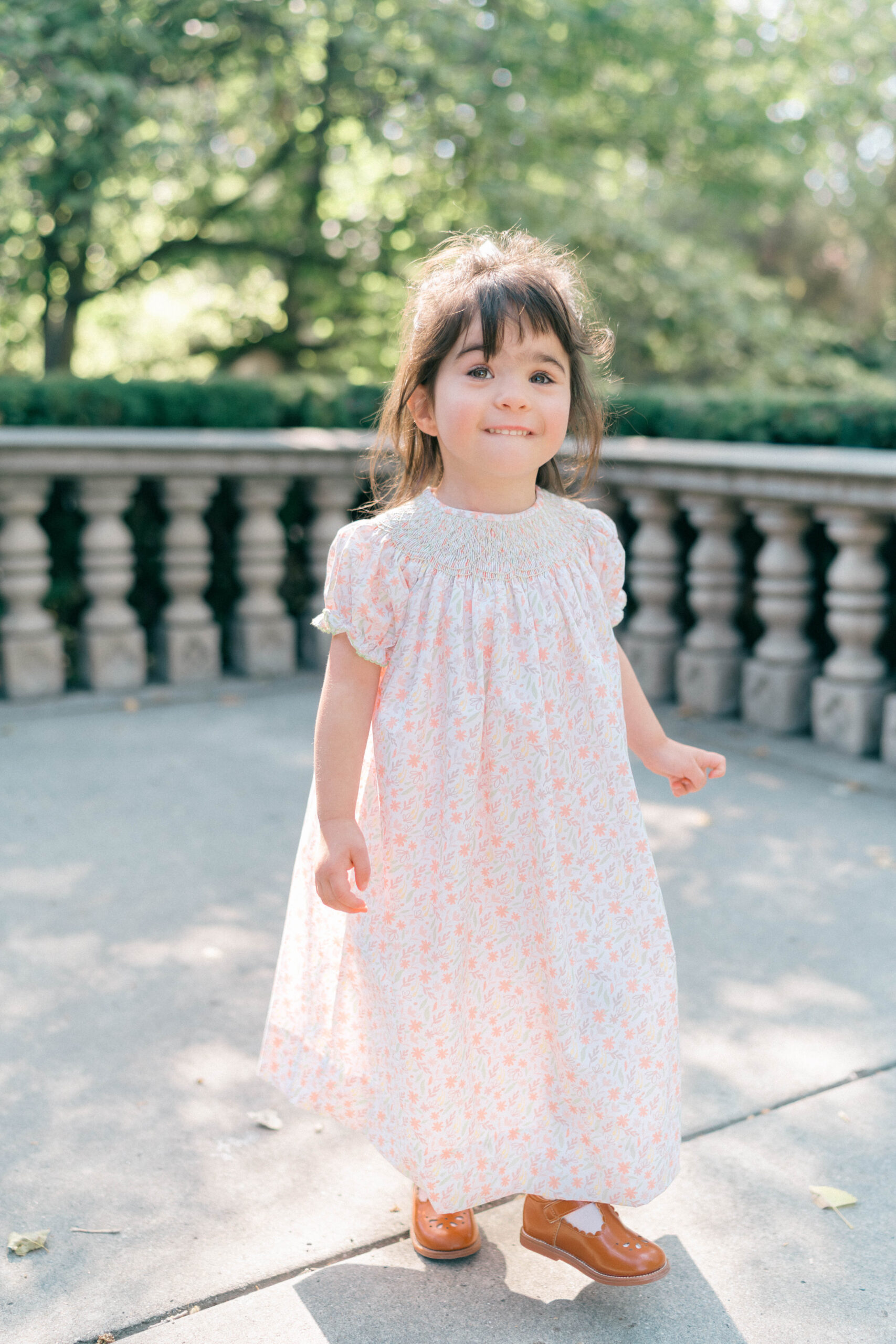 Salt Lake City heirloom portrait of a 4-year-old girl in vintage smocked dress.