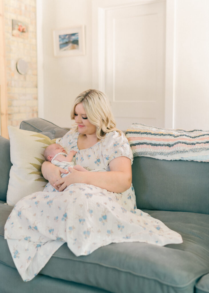 Lifestyle newborn photography in South Holladay pines ct – baby resting in a cozy crib, captured by Iris Graciela Photography.