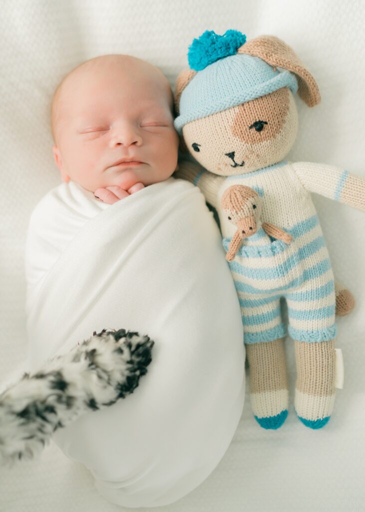 Sweet baby boy photographed in his vintage-inspired nursery, South holladay pines ct Utah newborn photographer.