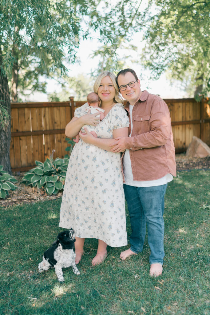 Candid family moments with newborn at home, photographed in Utah.