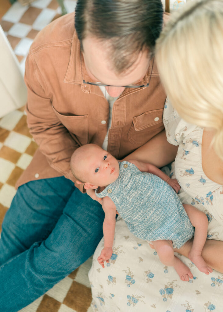 Sweet baby boy photographed in his vintage-inspired nursery, Utah newborn photographer. By Iris Graciela Photography.