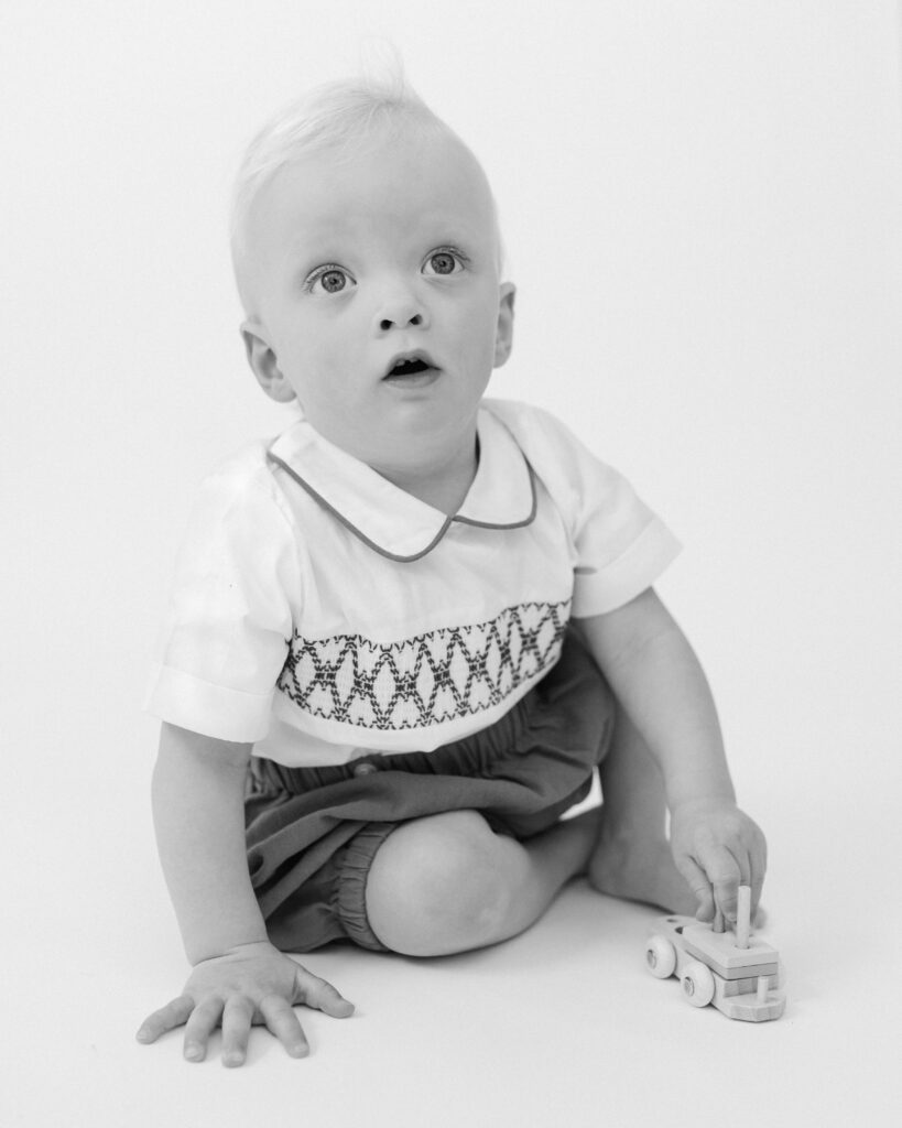 Child friendly in studio portrait session in Draper, Utah, traditional heirloom style by Iris Graciela Photography